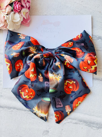 Pumpkins & Cauldron Bow ￼
